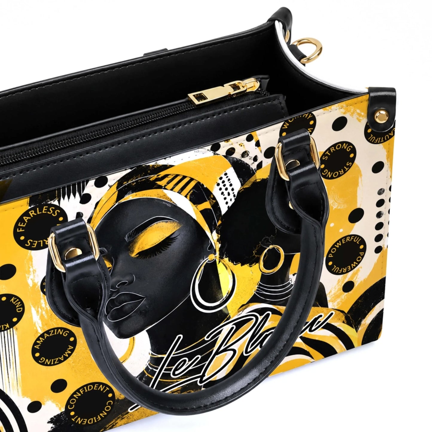 Close up of an interior view of a stylish black woman art handbag with zipper closure and artistic yellow and black design