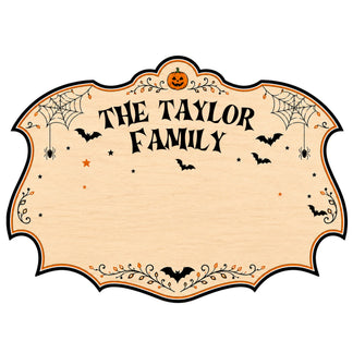 Blank Halloween family theme wooden sign template with pumpkin and spider web accents for custom name personalization.