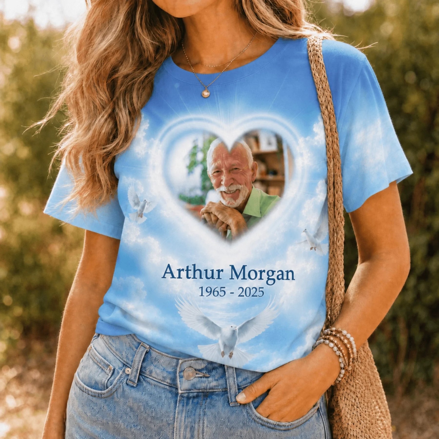 Blue custom photo t-shirt for memorial, featuring Arthur Morgan, dates 1965-2025, and a peaceful dove sky design.