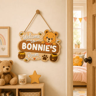 Wall hanging personalized wooden sign for a nursery with a bear design honey pots and the text Welcome to Bonnies Room