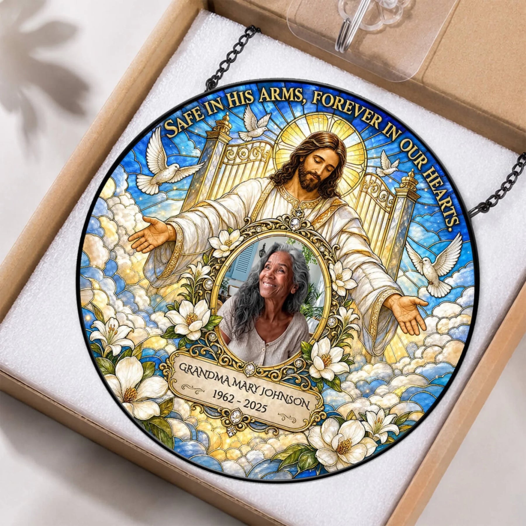 Beautifully boxed memorial suncatcher featuring a personalized photo and Jesus design, perfect for sympathy gifts.