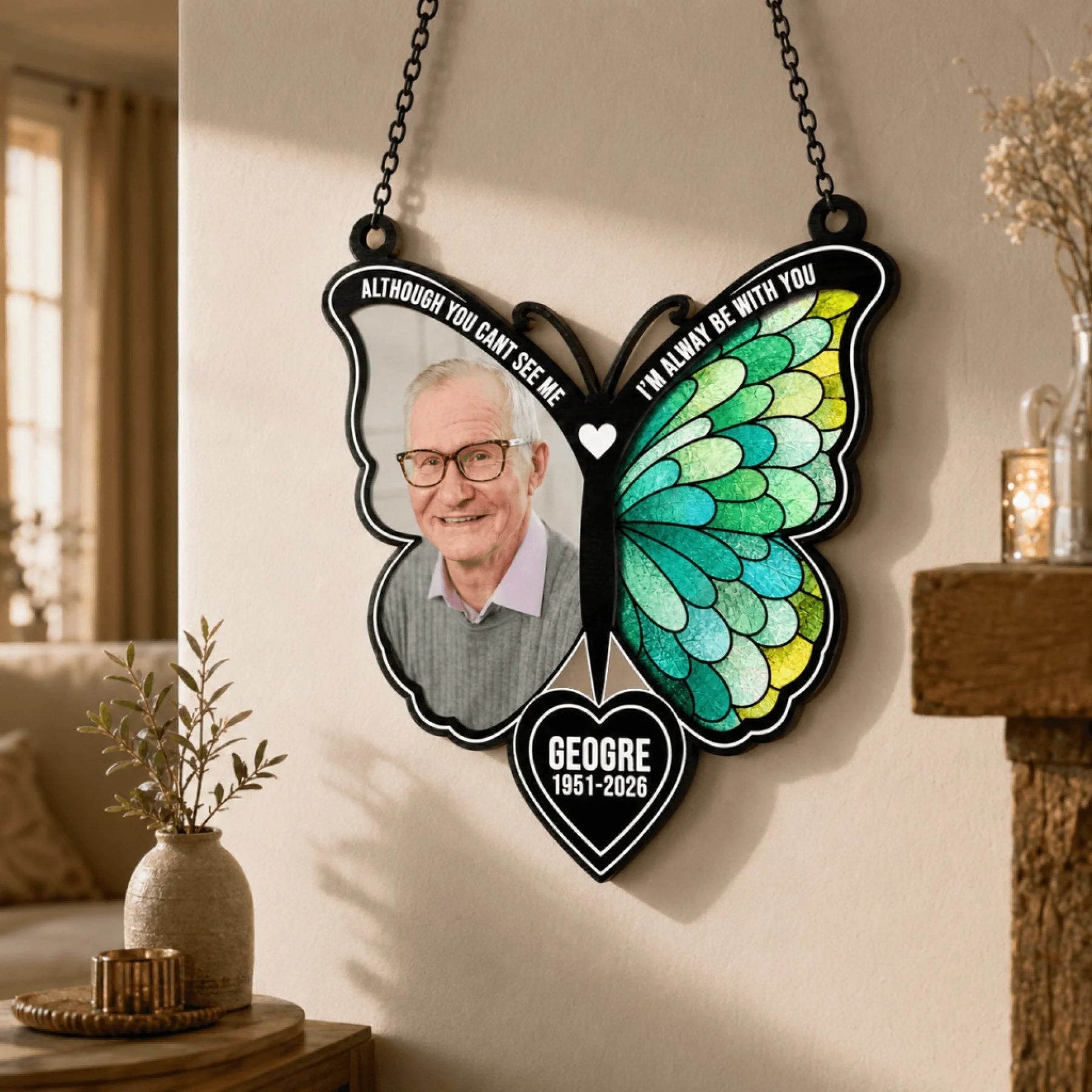 Decorative butterfly hanging ornament for memorial, personalized with a portrait photo, name, and remembrance dates.