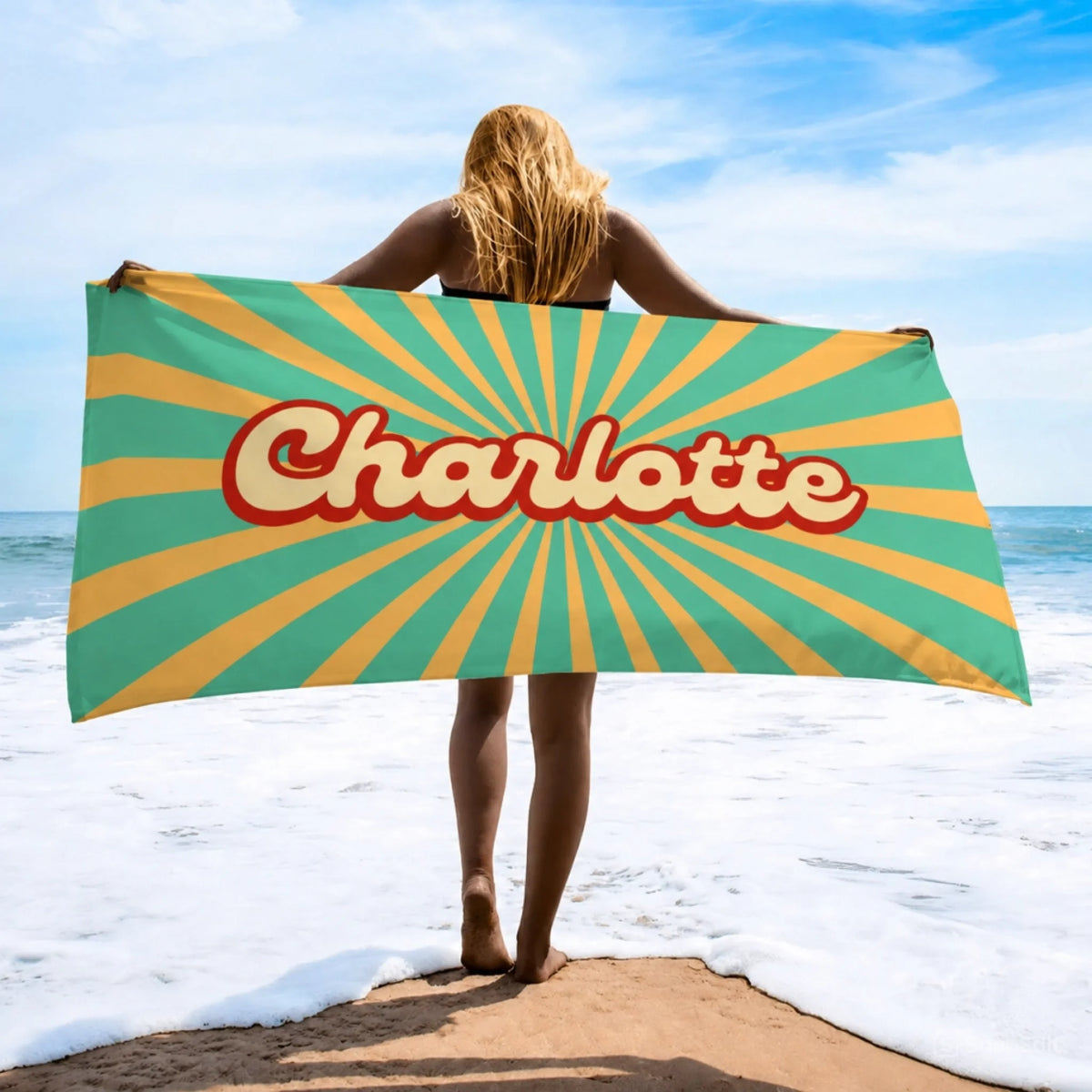Personalized Charlotte beach towel featuring a vintage yellow and teal sunburst pattern for summer vacation gifts.