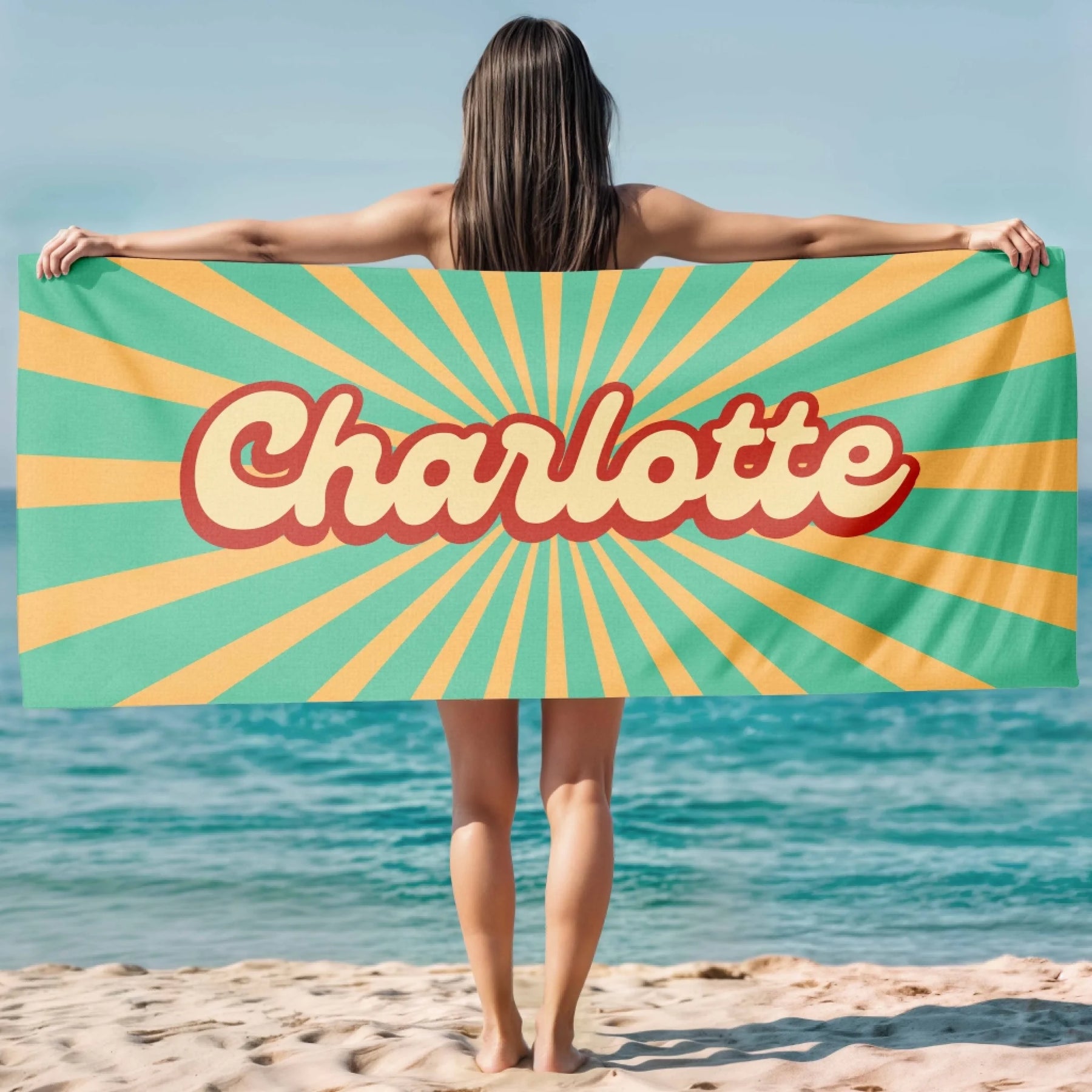 Custom Charlotte beach towel featuring a vintage retro sunburst design in teal and yellow for summer pool days.