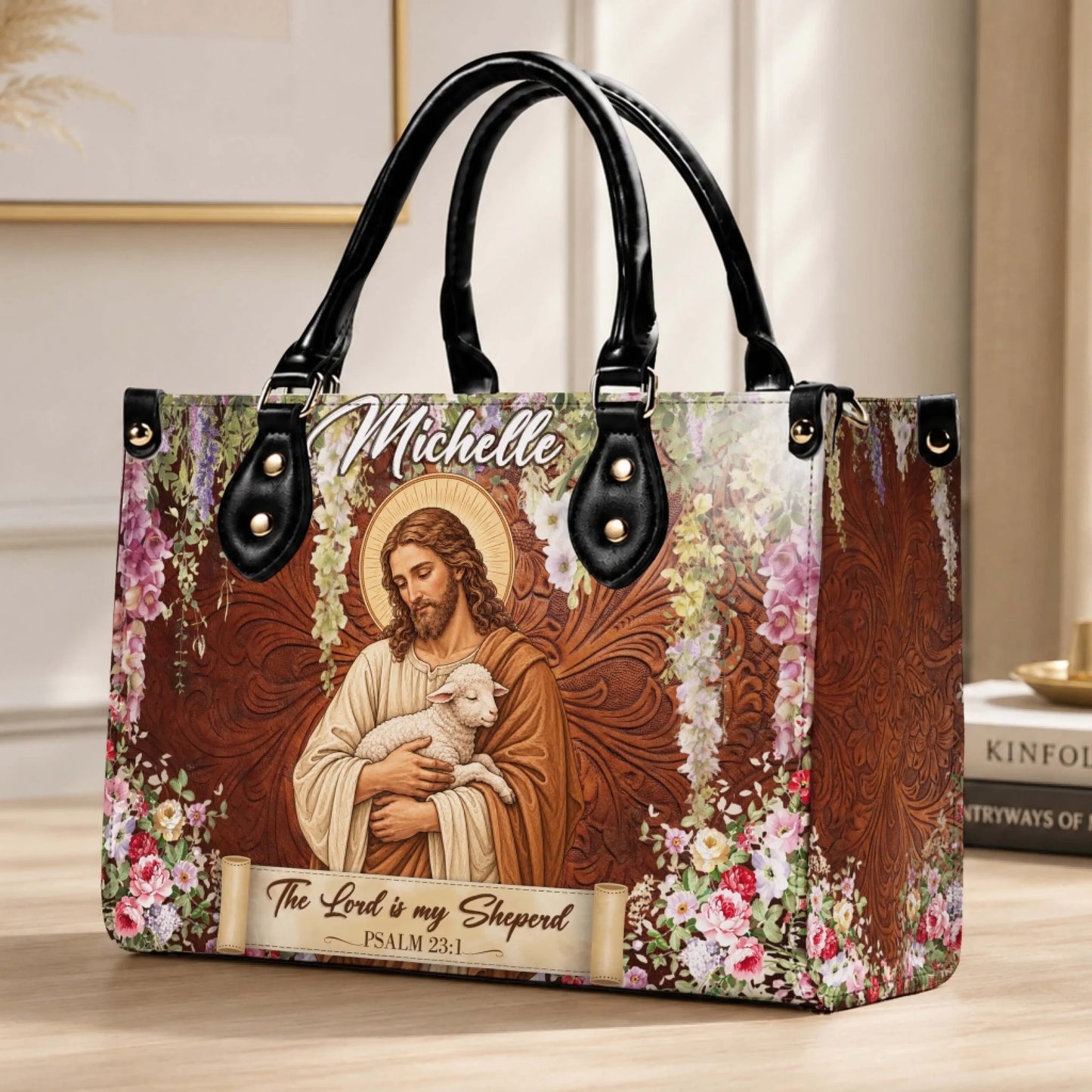 Elegant custom handbag with a Jesus and lamb artwork and the name Michelle, featuring a beautiful floral border design.