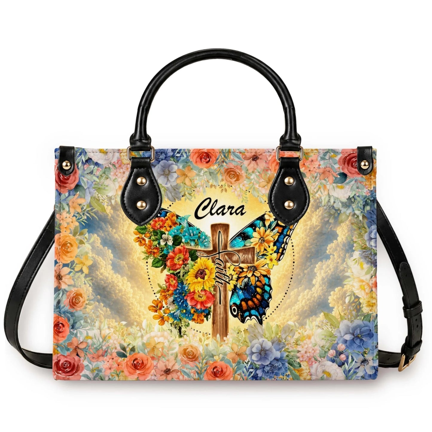 Customized handbag featuring a butterfly cross design with vibrant flowers and the name Clara for a thoughtful memorial gift.