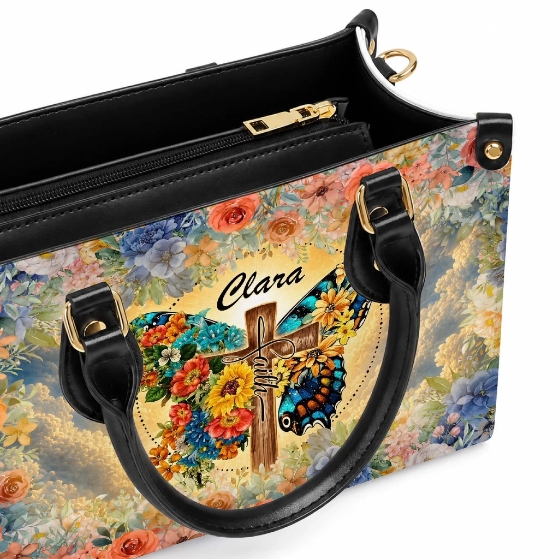 Customized handbag for Clara featuring a butterfly and cross floral design with faith written on the front.