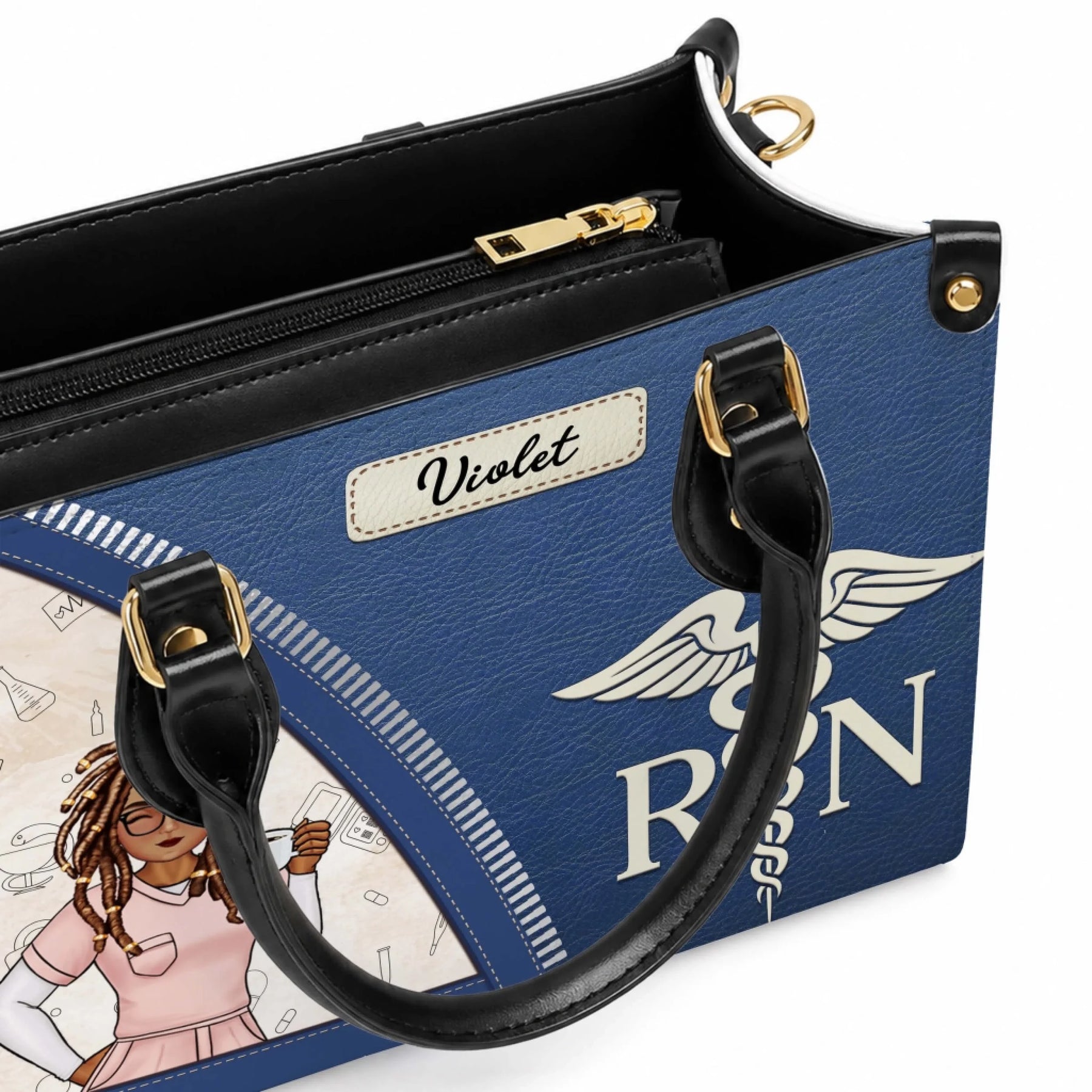 Detailed close up of a custom name nurse handbag showing the Violet name tag and professional navy blue leather finish.