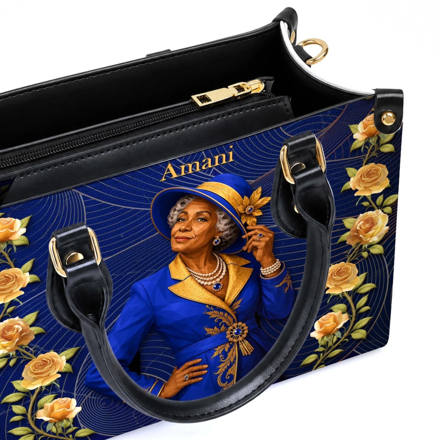 Detail of a custom blue and gold handbag with an elegant woman illustration and personalized Amani text label.