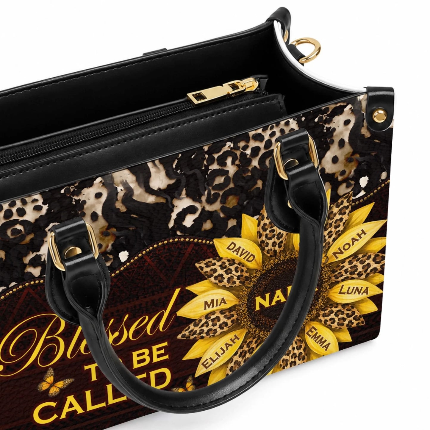 Detailed view of a stylish sunflower print handbag customized with the name Nana and family names on petals.