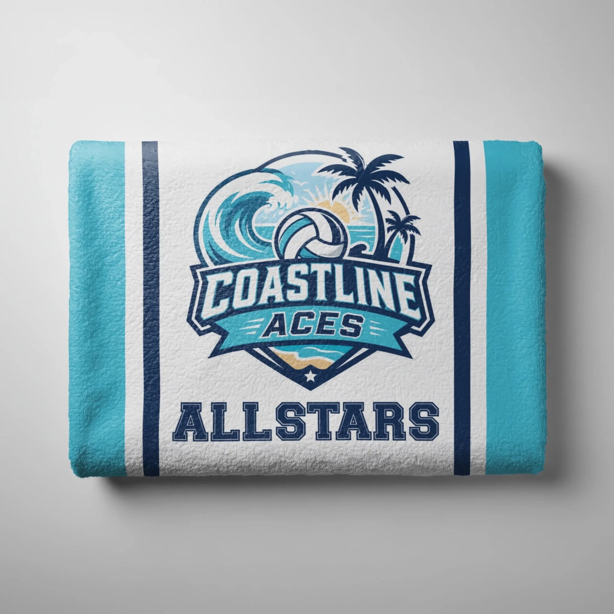 Folded Coastline Aces Allstars beach towel featuring a tropical volleyball logo with palm trees and ocean wave