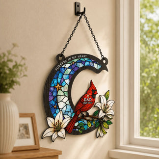 Decorative crescent moon suncatcher with a red cardinal and lilies, a thoughtful memorial gift for grieving.