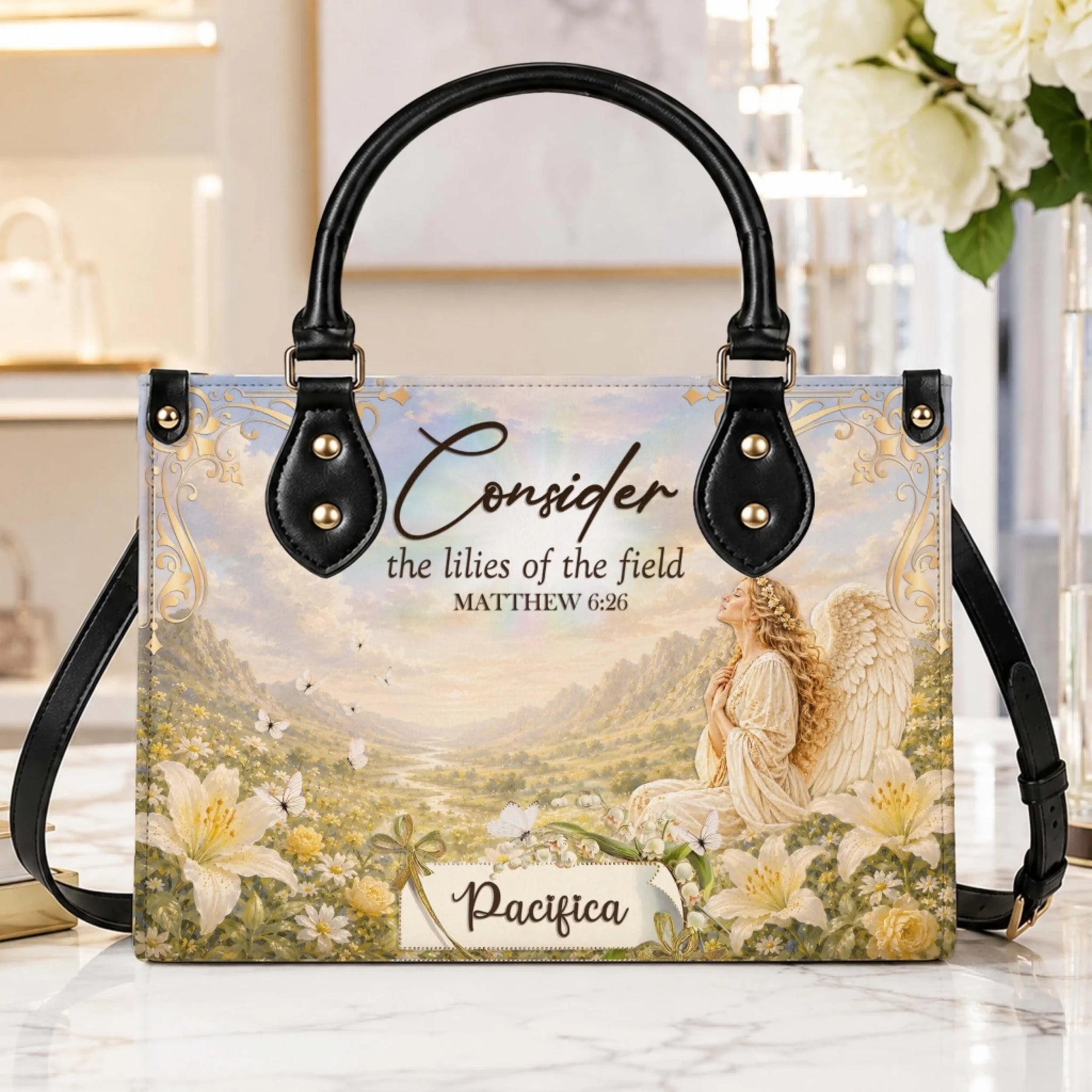 A beautiful personalized angel handbag featuring Matthew 6 26 scripture and a custom name on a elegant floral design.