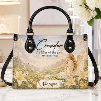 A beautiful personalized angel handbag featuring Matthew 6 26 scripture and a custom name on a elegant floral design.