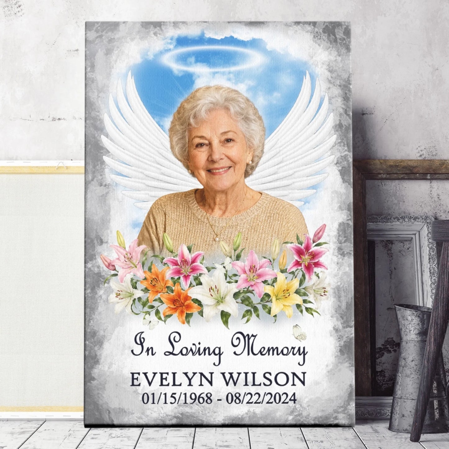 Personalized sympathy canvas art with angel wings and floral details, custom memorial photo, name, and date of passing.