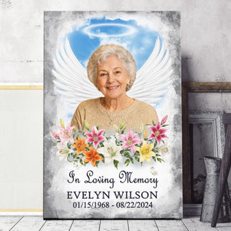 Personalized sympathy canvas art with angel wings and floral details, custom memorial photo, name, and date of passing.