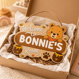 Personalized wooden bear wall sign for a nursery decor packed in a gift box with tissue paper perfect for baby showers