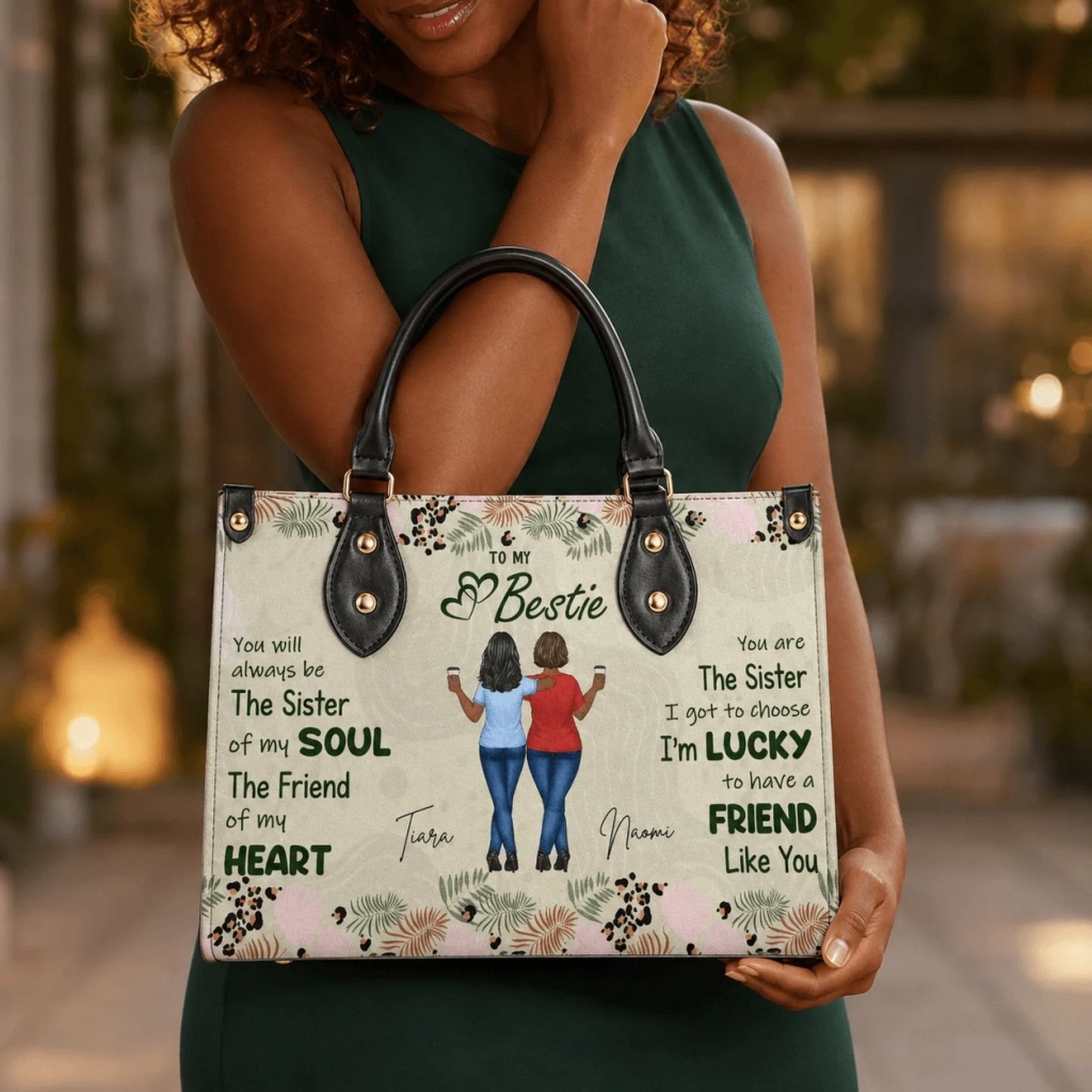 A woman holding a personalized handbag with a best friend illustration, custom names, and a heartfelt friendship quote.