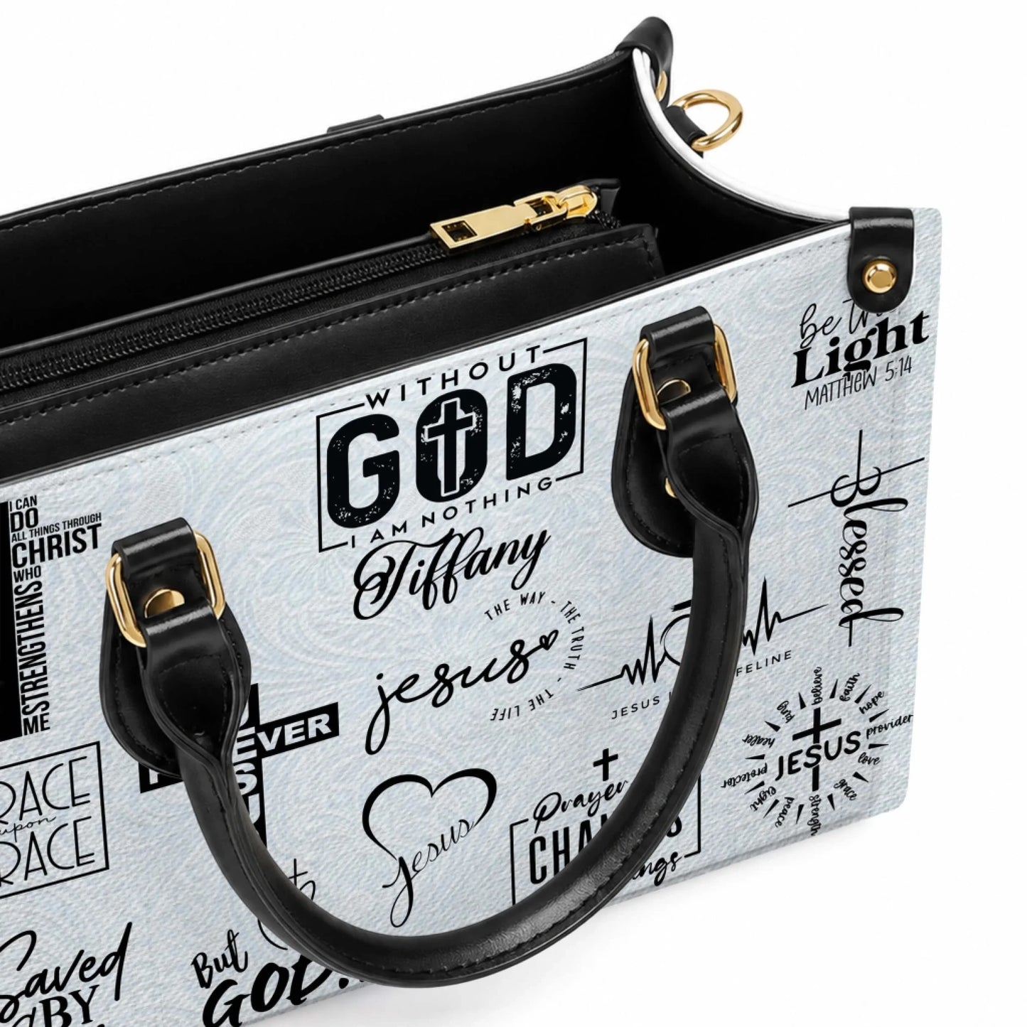 Close up of a personalized faith themed handbag showing the interior zipper compartment and inspirational text.