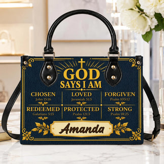 Elegant navy Christian handbag customized with the name Amanda, showcasing inspiring Bible verses and gold hardware.