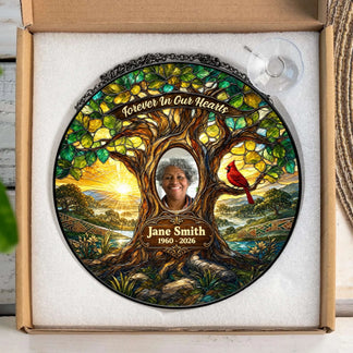 Personalized memorial stained glass style suncatcher in a box with custom photo, name, and dates, featuring a red cardinal.