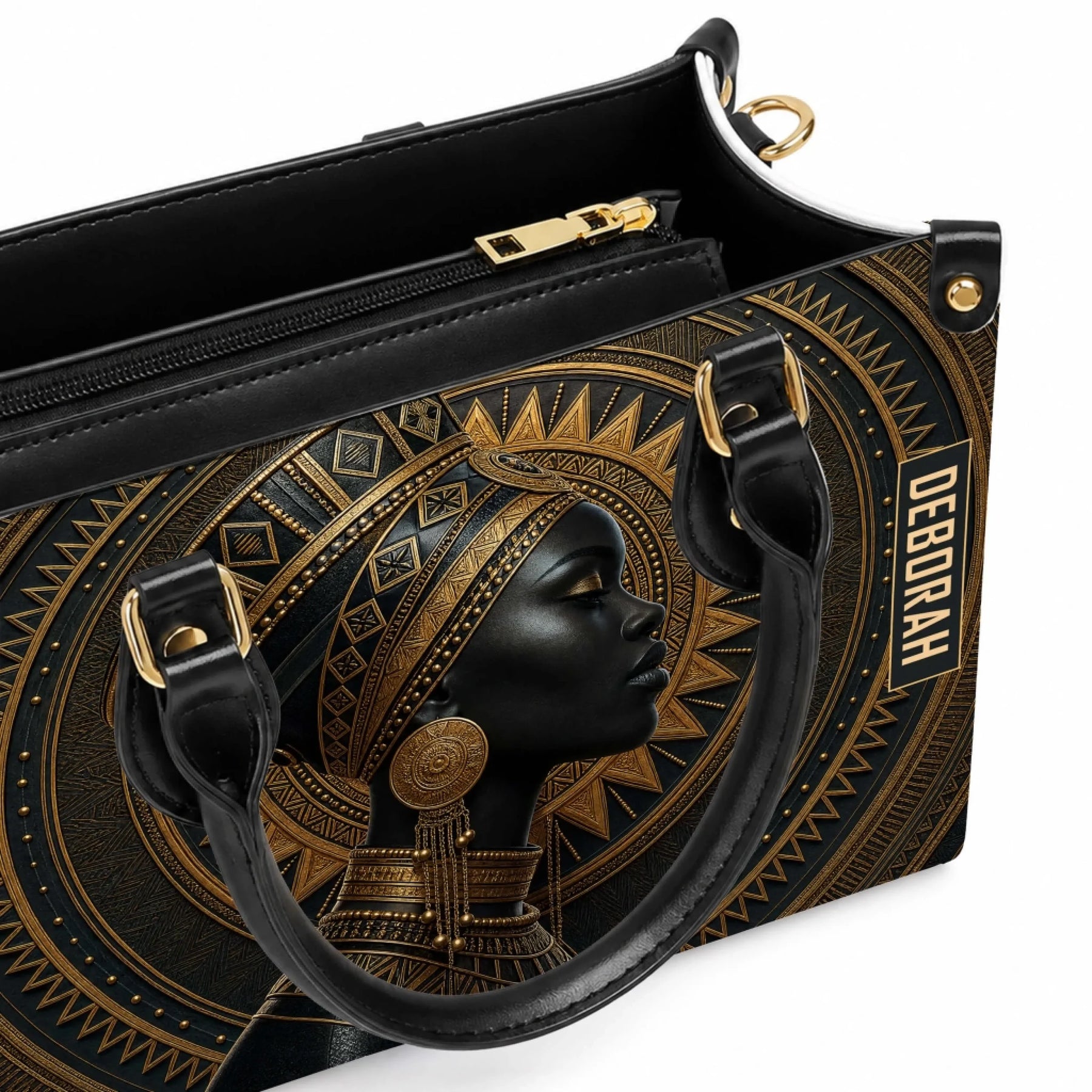 Close up view of the interior of a personalized African queen themed handbag with gold hardware and custom name.