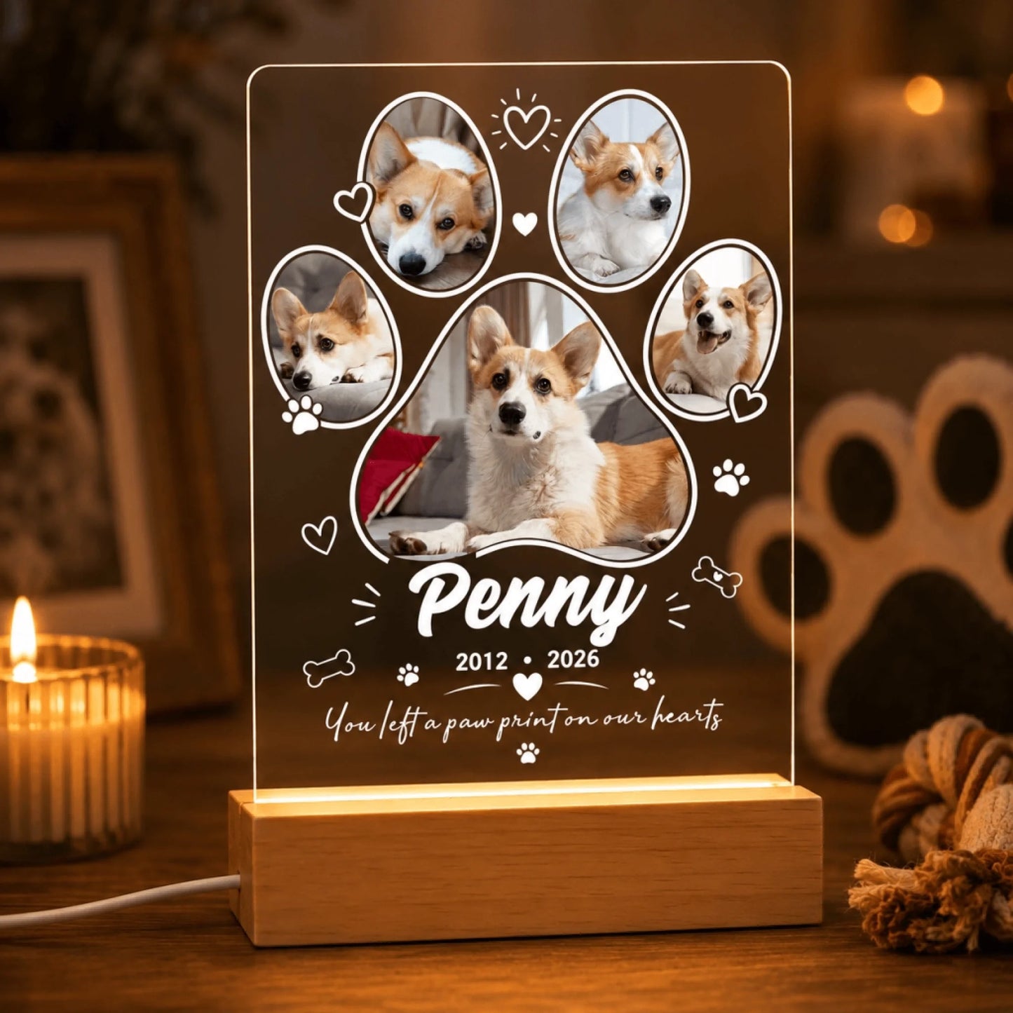 Personalized LED night light for pet loss with 5 photos, name Penny, years 2012 to 2026, and paw print design.