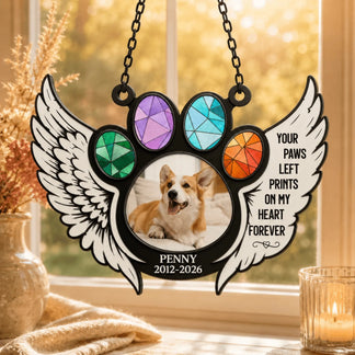 Beautiful personalized dog keepsake with a photo and the quote Your Paws Left Prints On My Heart Forever in a stained glass frame.
