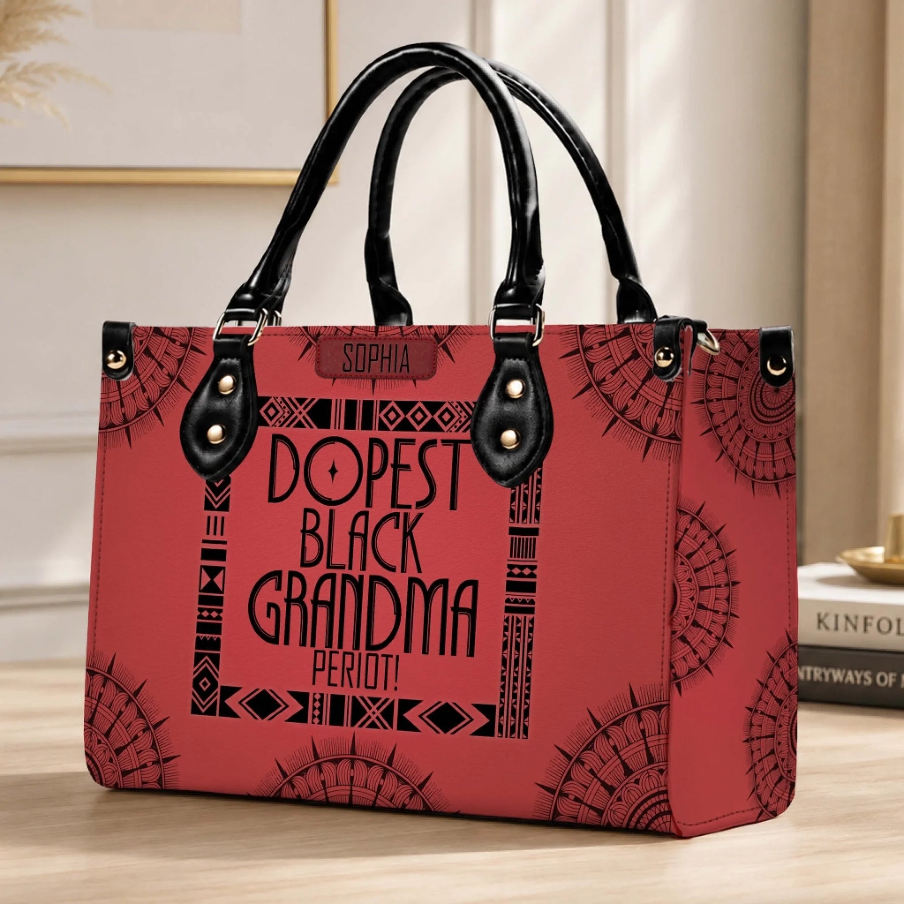 Customized red handbag with black geometric accents and the quote Dopest Black Grandma Periot as a birthday gift.