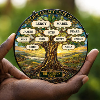 Personalized acrylic suncatcher held in hand showcasing a family tree design with multiple custom names and legacy quote.