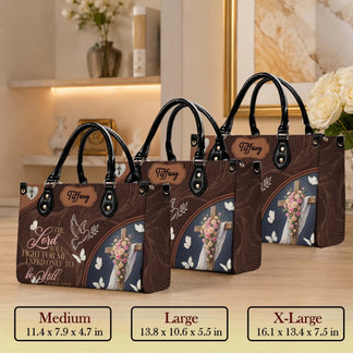 Display of three size options for religious themed personalized floral cross handbag for Christian gift occasions