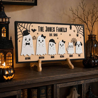 Decorative tabletop wooden sign featuring a personalized ghost family and pets for festive Halloween home decor.