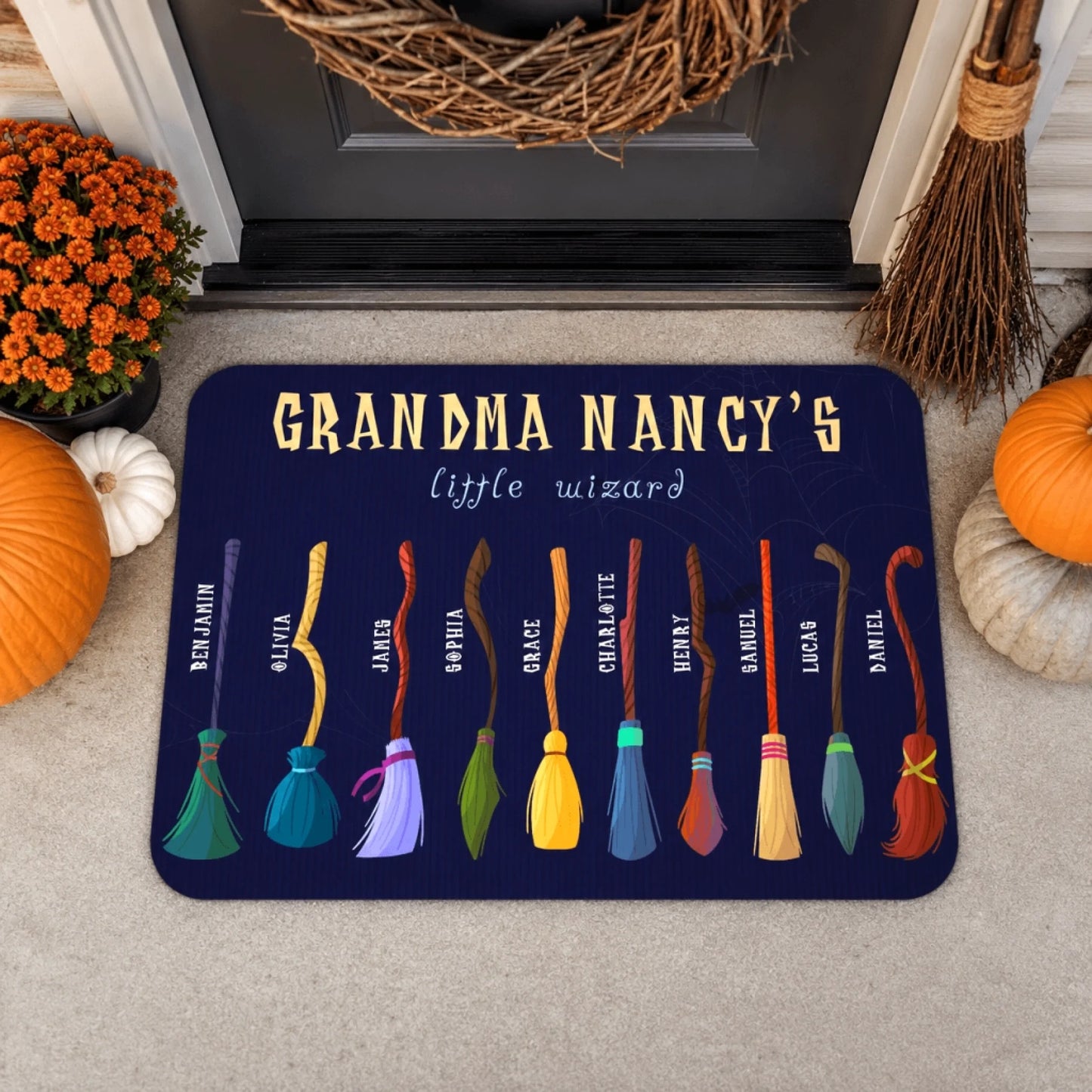 Personalized Grandma Nancys little wizard Halloween welcome mat featuring custom broomstick names for a spooky family themed entry.