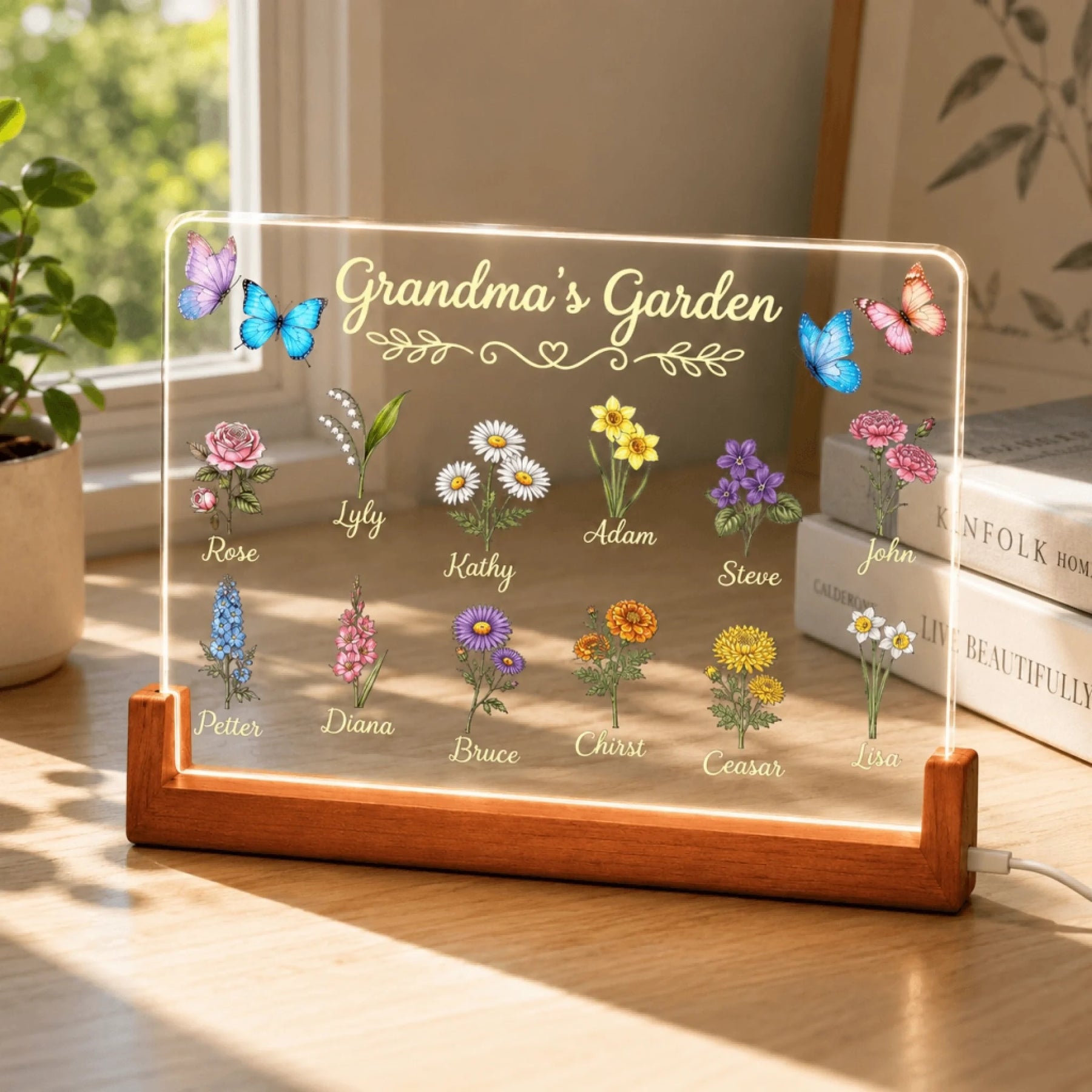 Decorative Grandma's Garden LED acrylic night light featuring custom family names and botanical flower illustrations.