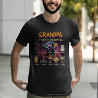 A man models a black personalized Halloween t-shirt with a Grandpa of Little Monsters design and family names.
