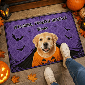 Customized halloween doormat for pet owners with a golden retriever photo and the phrase Welcome Foolish Mortals.