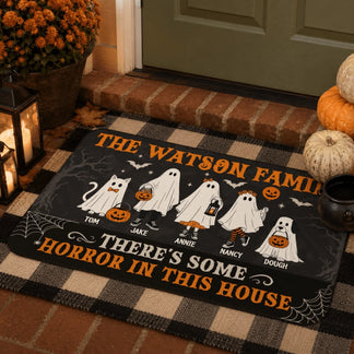 Decorative halloween welcome mat with personalized ghost family design for festive autumn porch and entryway decor.