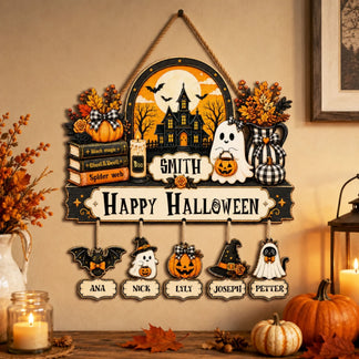 Custom Happy Halloween wooden wall decor featuring a personalized family name and hanging ornaments for each family member.