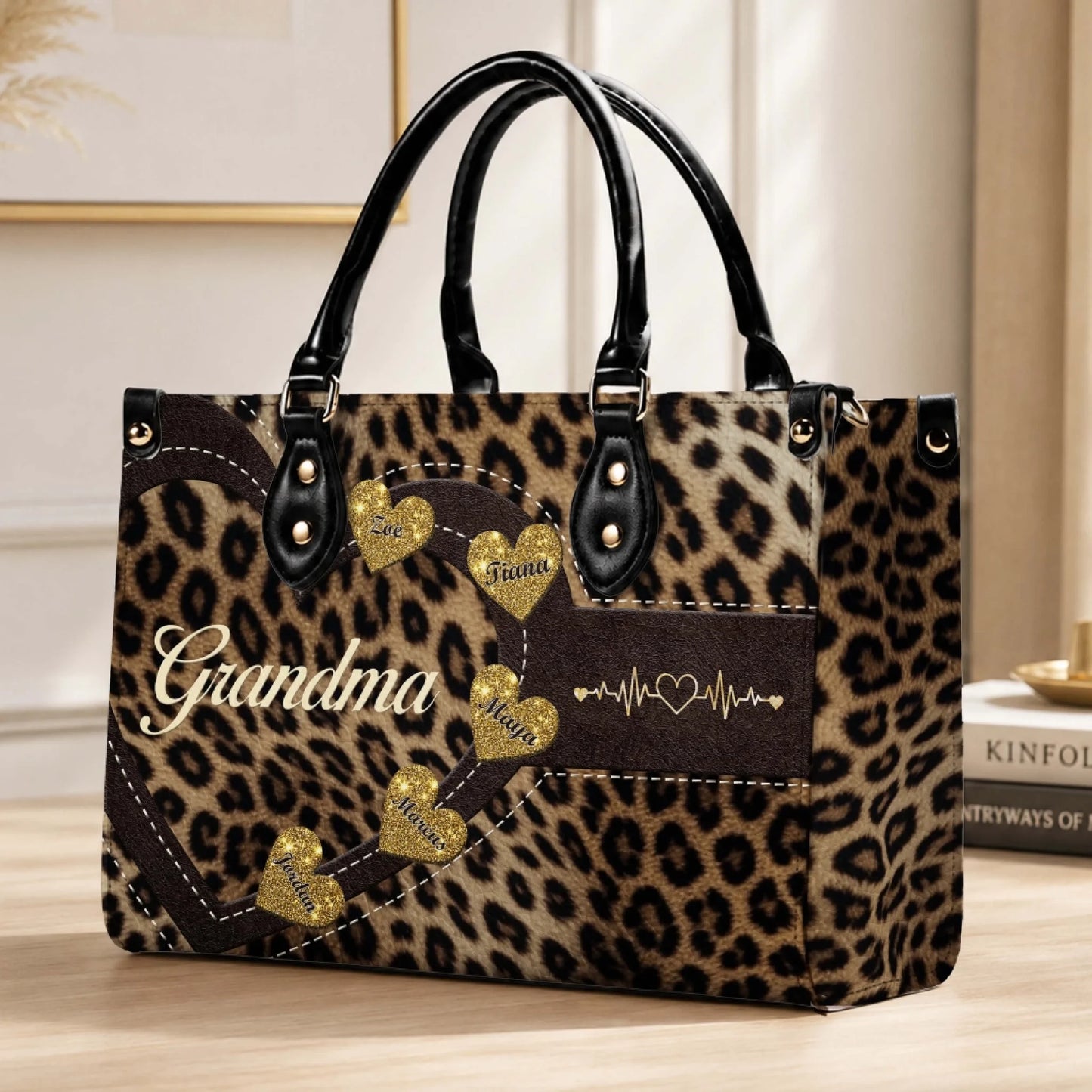 Personalized leopard print handbag for grandma with custom glitter heart name tags and a heart monitor graphic.