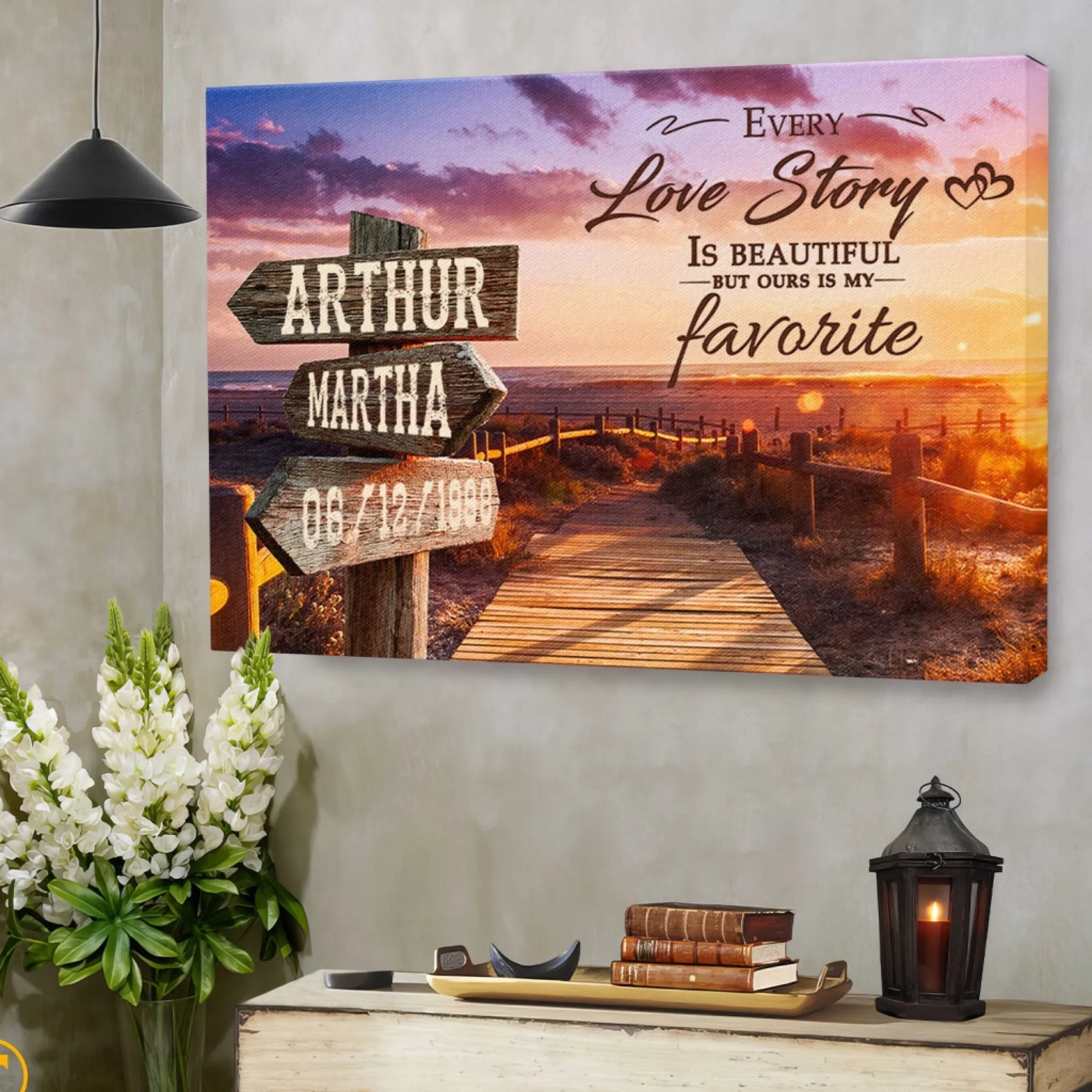 A personalized canvas art piece with a romantic beach sunset background, custom names, and date, perfect for anniversary home decor.