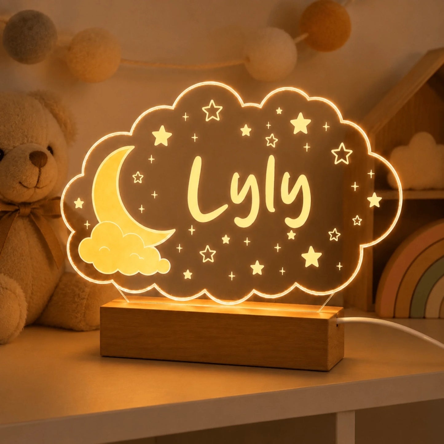 Personalized LED night light in a cloud design featuring the name Lyly, a sweet gift for a nursery or bedroom.
