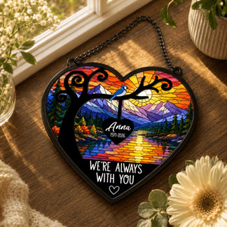 Heart shaped memorial acrylic suncatcher with a beautiful stained glass mountain landscape and a blue jay for sympathy gift.