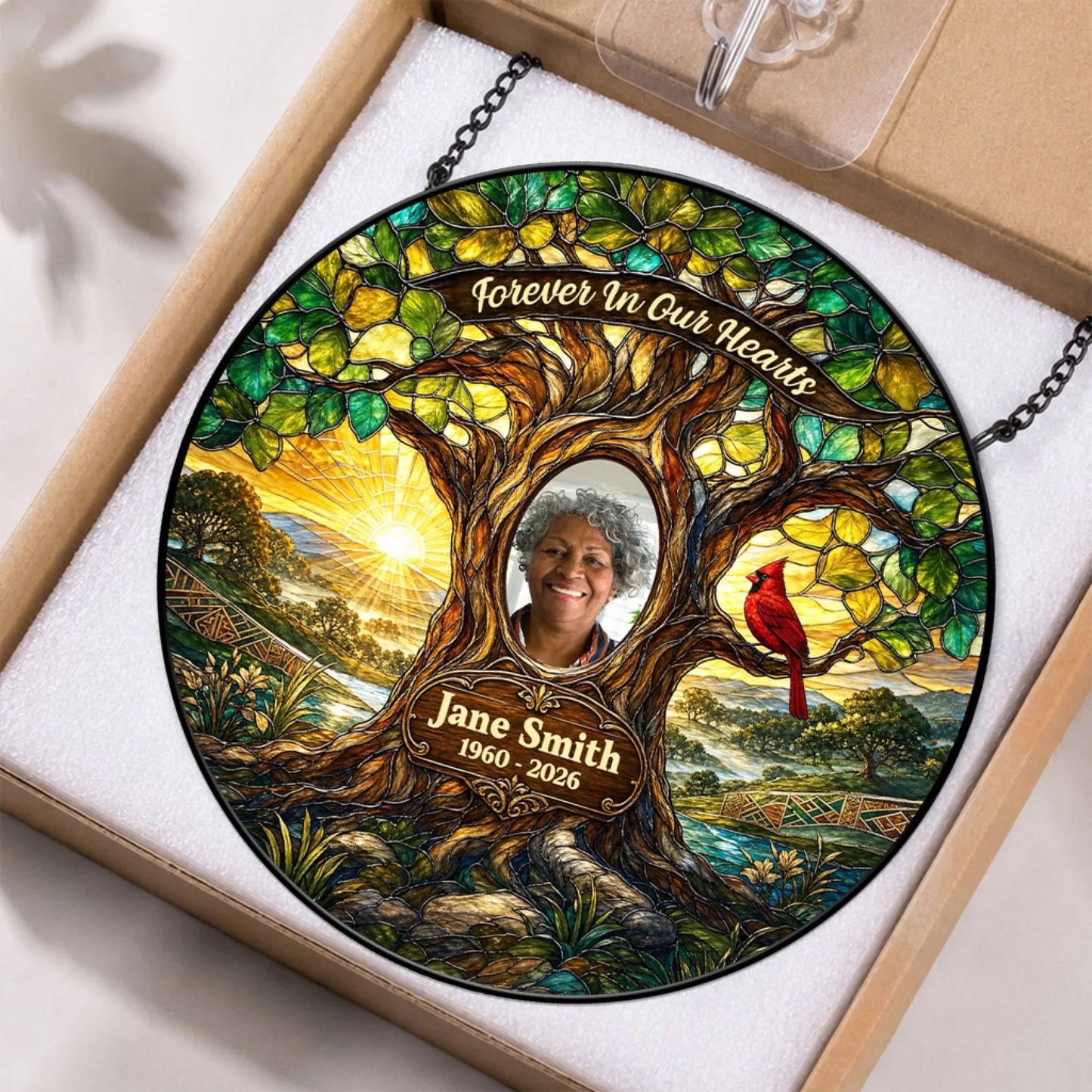 Custom memorial keepsake suncatcher in a gift box with a tree of life, cardinal illustration, and personalized photo and name.