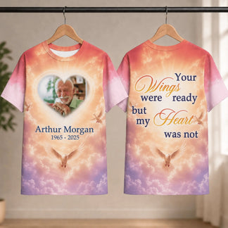 Personalized memorial t-shirt with a custom photo heart, dove imagery, and touching quote on a sunset sky.