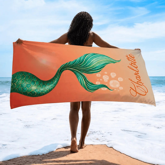 Personalized mermaid tail beach towel for kids featuring the custom name Charlotte for fun summer pool days.