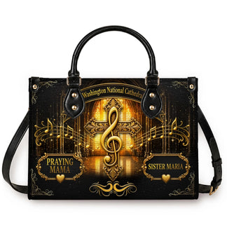Personalized handbag with Praying Mama and Sister Maria text featuring a cross, treble clef, and cathedral design.