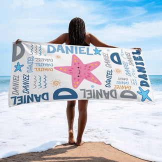 Soft personalized beach towel with a starfish graphic and Daniel text for summer beach trips and pool days.