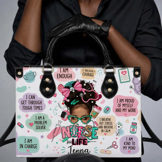 Close up of a custom nurse life tote bag with motivational quotes and medical illustrations held by a woman