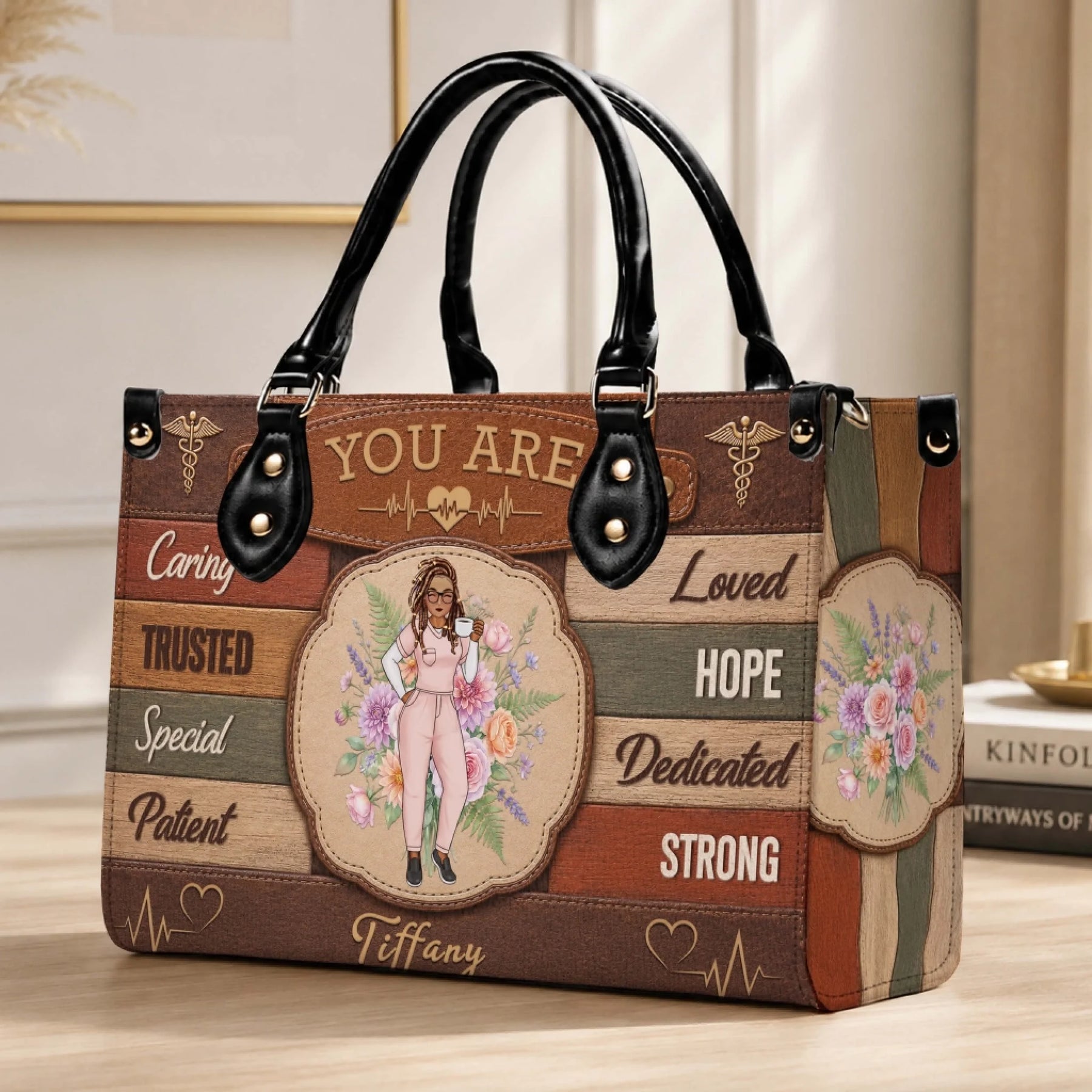 A personalized nurse handbag decorated with floral art and uplifting quotes designed for healthcare professionals.