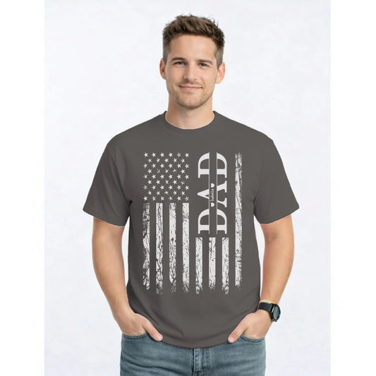 Man wearing a gray t-shirt with an American flag design and 'DAD' text on a white background